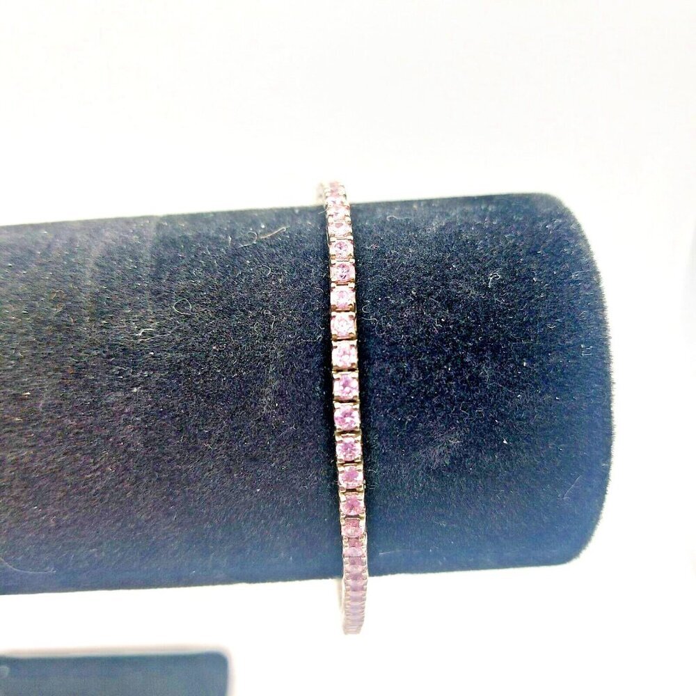 Pink CZ tennis bracelet Sterling Silver marked 925 and ADI 60 stones
